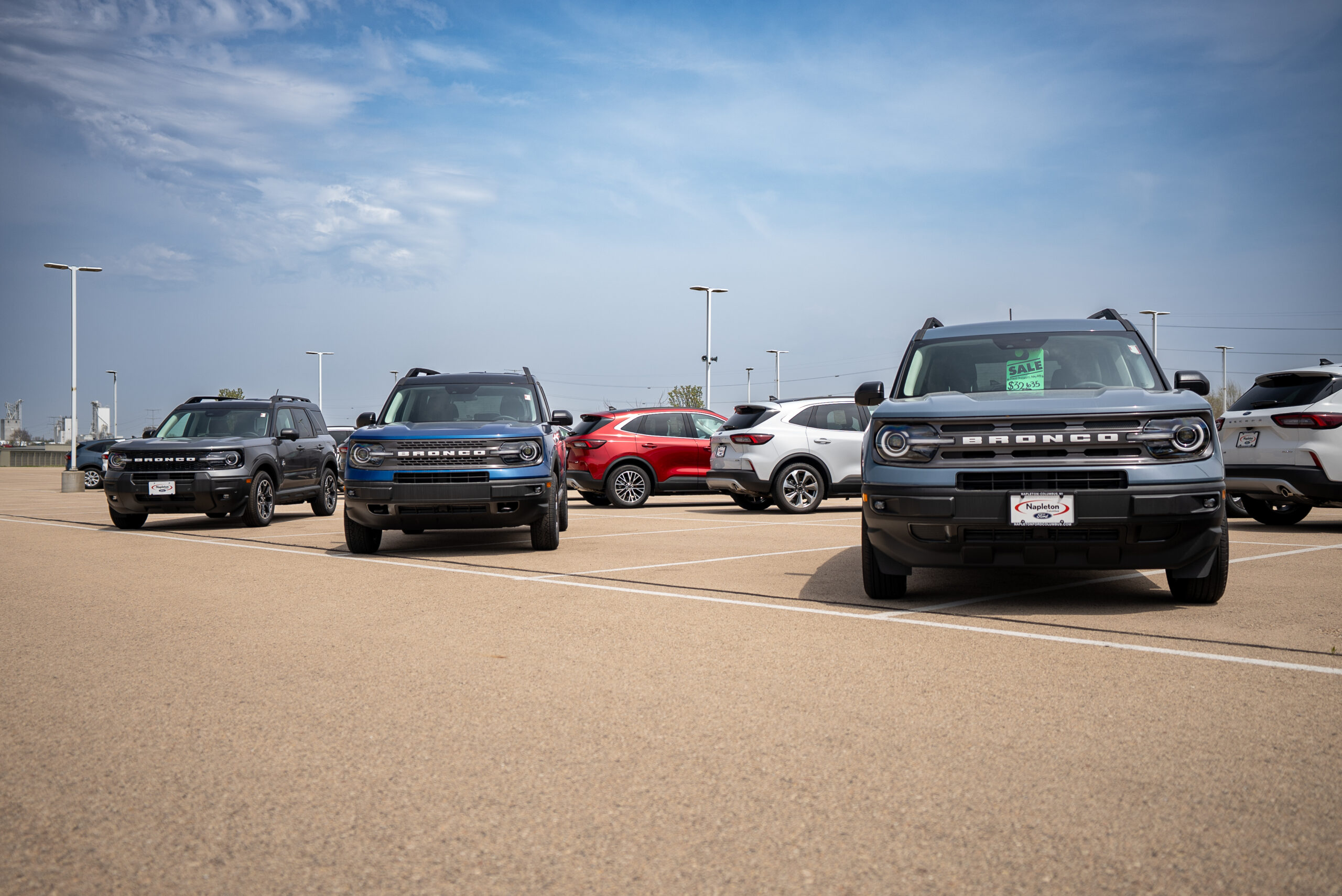 Vehicles on display at a community car event